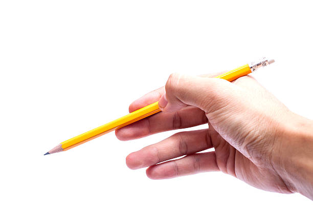 istock Hand with pencil writing something isolated on white background 505805964