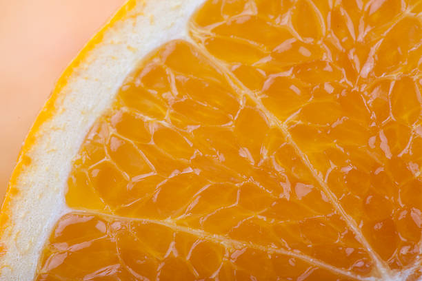 istock slice of orange macro closeup 505816952
