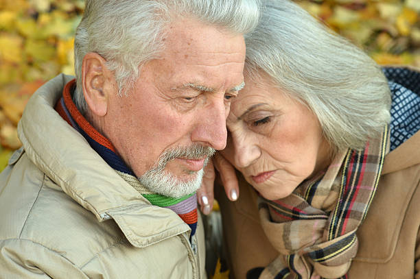 istock Sad senior couple in  park 505817030
