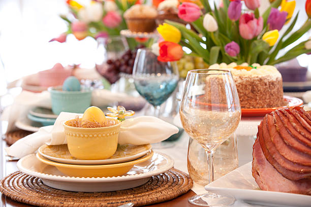 istock Easter Elegant Place Setting Dining Table with Vase of Tulips 505820360