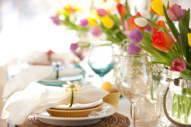 istock Easter Elegant Place Setting Dining Table with Vase of Tulips 505820400
