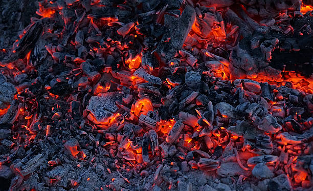 istock the burning coals of a fire 505821104