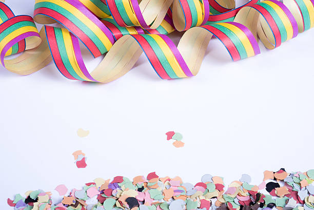 istock streamers and confetti for carnival on white background 505822556