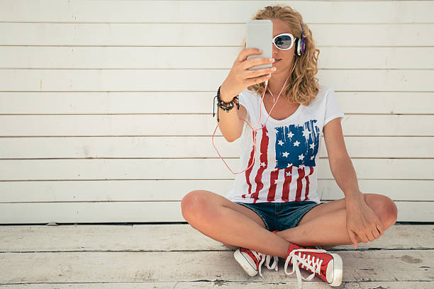 istock Dj taking selfie against wooden wall 505822608