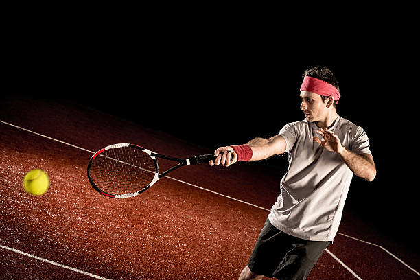 tennisspieler-action: vorhand - indoor tennis flash stock-fotos und bilder