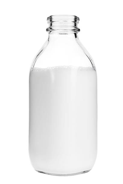 ガラスの牛乳瓶白背景 - quart ストックフォトと画像