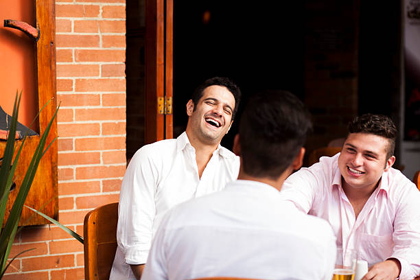 istock Man laughs out loud with your friends 505823398