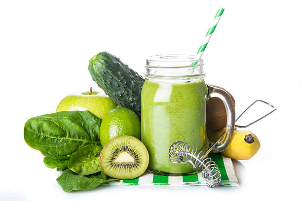 istock Green smoothie isolated on a white background 505824216