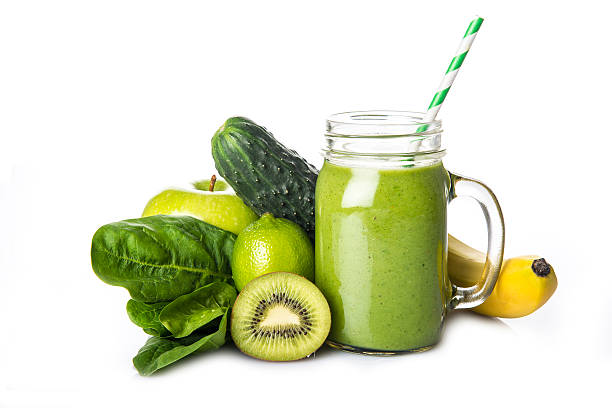 Green smoothie isolated on a white background stock photo