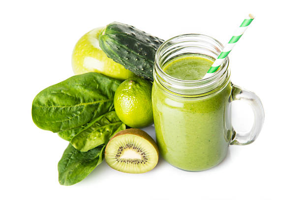 istock Green smoothie isolated on a white background 505824754