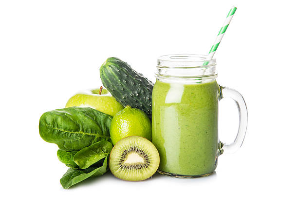 Green smoothie isolated on a white background stock photo