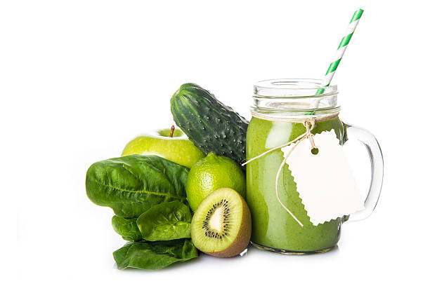 istock Green smoothie isolated on a white background 505825150