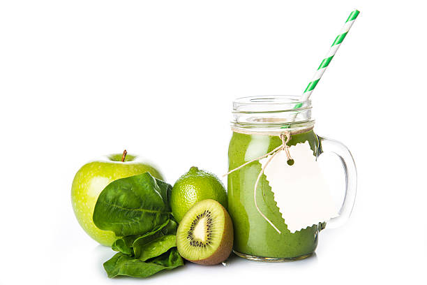 istock Green smoothie isolated on a white background 505825276