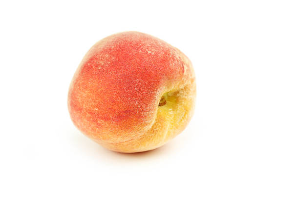 istock Ripe peach fruit isolated on a white 505826130