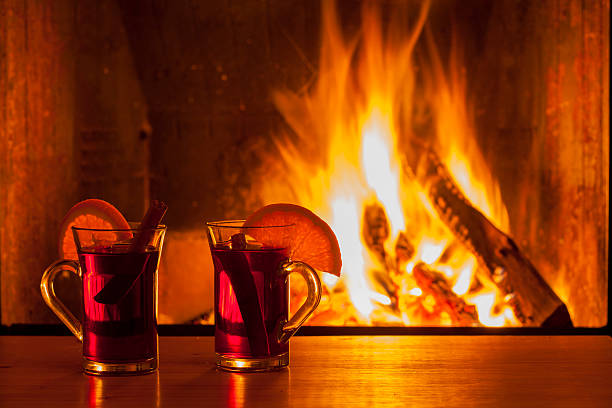 istock drinks and food at cozy fireplace 505828124