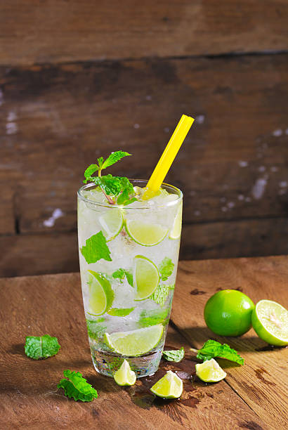 istock Mojito , lime pieces , leaves of mint with ice and rum 505838087