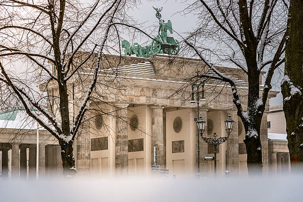 istock view on Berlin Brandenburger Tor with snow 505839332