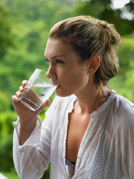 istock Side View Of Woman Drinking Water 505839689