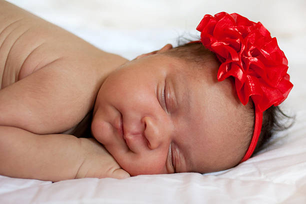 istock newborn baby girl sleeping. 505841757