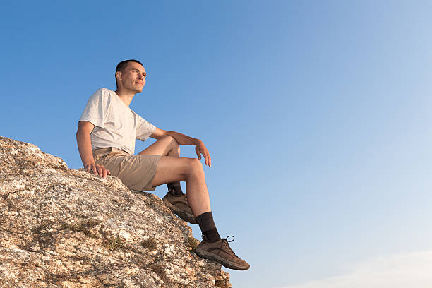 istock Tourist on the rock 505842047