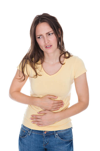 istock Young Woman Suffering From Stomach Ache 505842215
