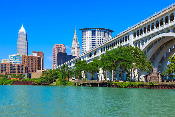 Cleveland skyline, Ohio Cleveland skyline and the Cuyahoga River, Ohio cuyahoga river photos stock pictures, royalty-free photos & images