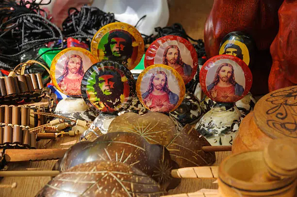 Gift stand in Cuba with pins of Che Guevara and Jesus.