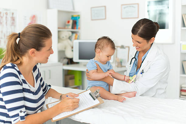 istock Cute baby boy at doctor's office. 505843071