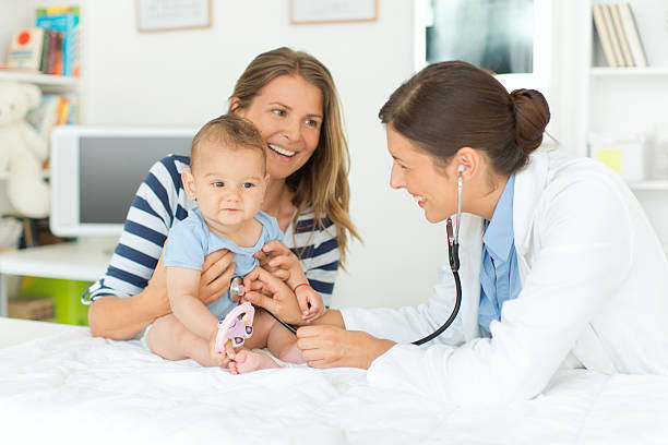istock Cute baby boy at doctor's office. 505843077