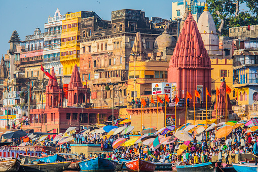 Varanasi, India - October 4, 2015: Skyline of the city of Varanasi India. This is the most holy of all indian city. Thousands of pilgrims arrive at their ghats everyday to bath and pray at the river Ganges.