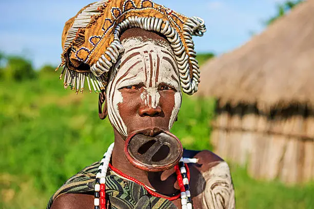 Mursi tribe are probably the last groups in Africa amongst whom it is still the norm for women to wear large pottery or wooden discs or ‘plates’ in their lower lips.http://bem.2be.pl/IS/ethiopia_380.jpg