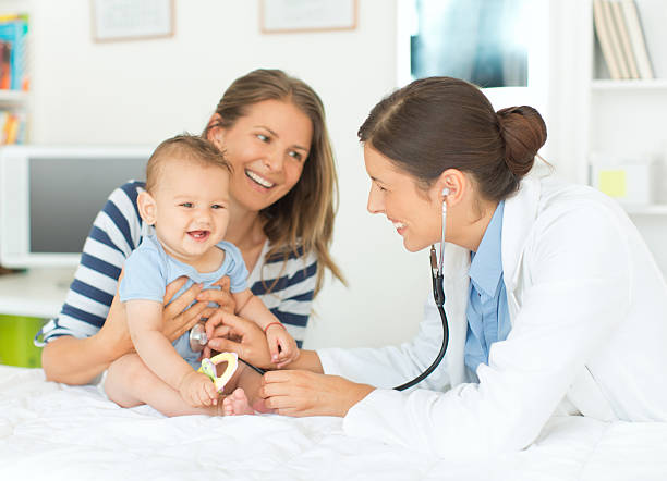 istock Cute baby boy at doctor's office. 505843825