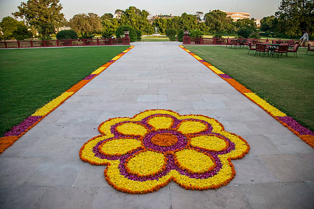flower decorations flower decorations on the road in india flower rangoli stock pictures, royalty-free photos & images