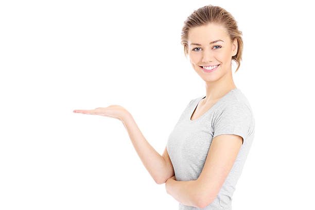istock Happy woman presenting your product 505844828
