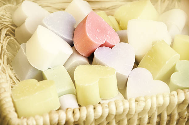 istock Collection of heart shaped soaps in wicker basket . 505844858