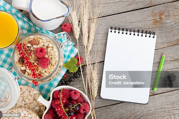 Healty Breakfast With Muesli Berries And Orange Juice Stock Photo - Download Image Now