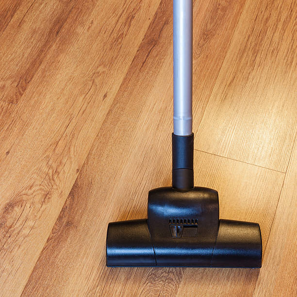 istock front view clearing of laminate by vacuum cleaner 505846036