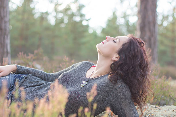 istock Beautiful woman in mossy forest 505847066