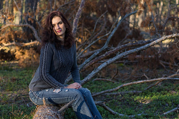 istock Beautiful woman in mossy forest 505847624