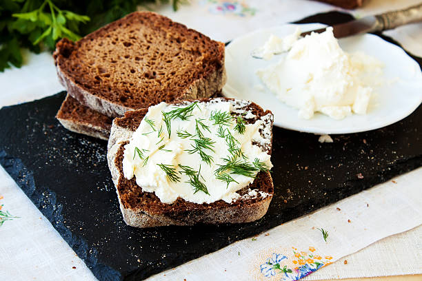istock Rye bread and cream cheese with herbs 505848058