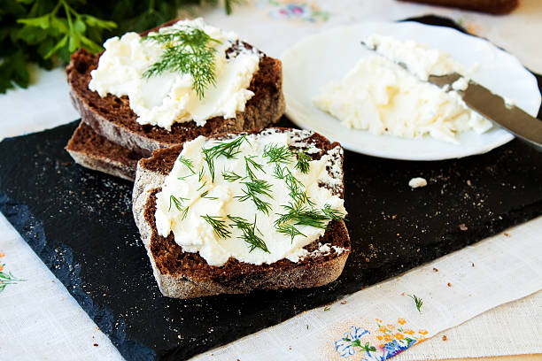 istock Rye bread and cream cheese with herbs 505848106