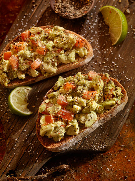 istock Avocado Toast with Tomatoes on Rye Bread 505850338