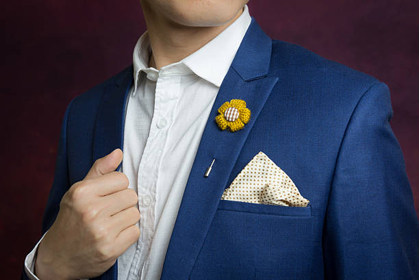 istock man in blue suit, brooch, handkerchief 505853020