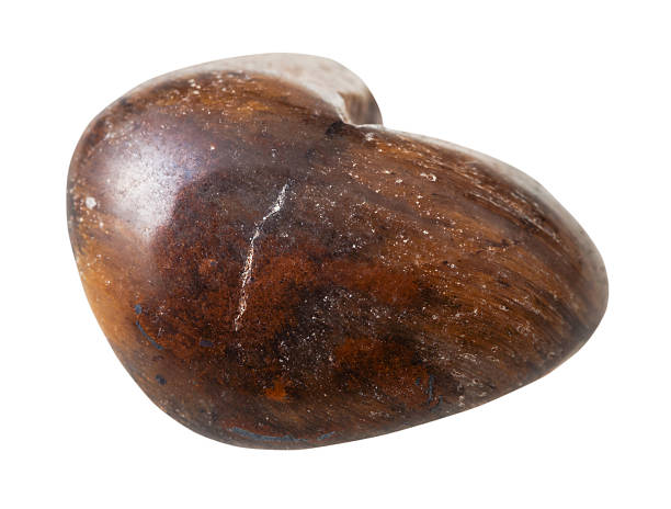 istock brown tiger eye stone gemstone isolated 505864906