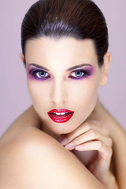 istock young beautiful woman with make up smiling into camera 505865474