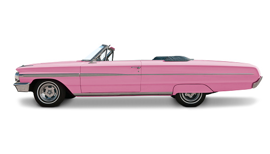 A 1964 Ford Galaxie 500 pink convertible.  Vehicle has clipping path. All logos removed. 