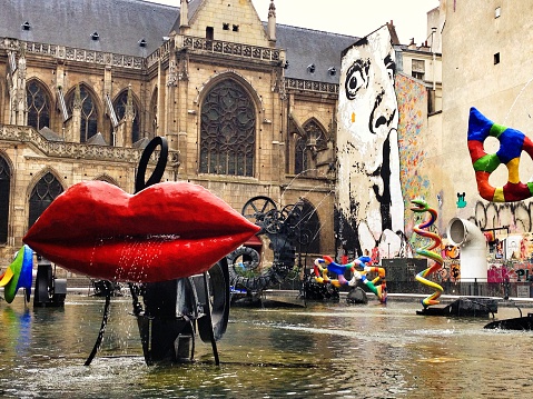Paris,France -July 9th 2014: Stravinsky fountain next to centre Pompidou. This is a fountain featuring 16 sculptures that move and spray water, designed as a commemoration to the late composer, Igor Stravinsky.