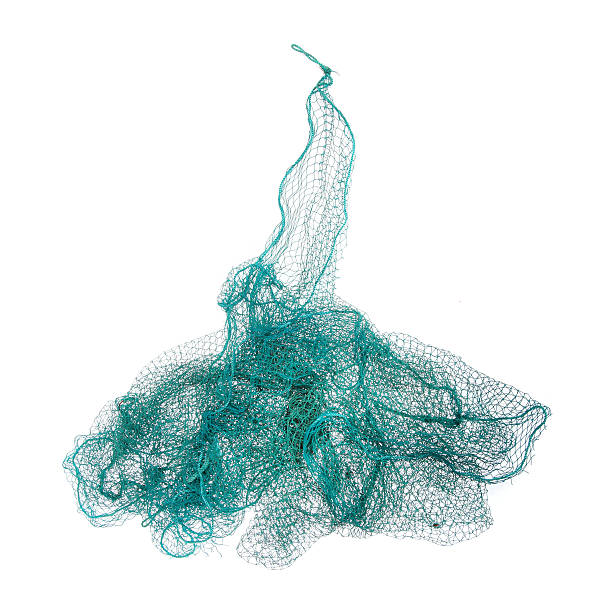 Fishing net. Fishing net isolated on a white background. commercial fishing net stock pictures, royalty-free photos & images