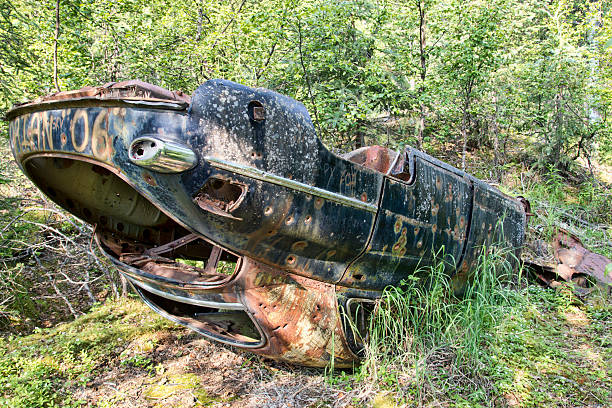 istock Old wreck in the woods. 505870084