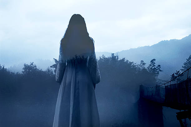 istock Mysterious Woman in White Dress 505870721
